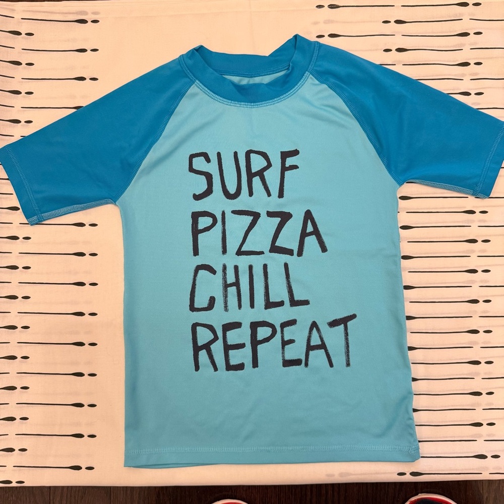 Blue Short-Sleeve Kids Rashguard with 'Surf Pizza Chill Repeat' Graphic
